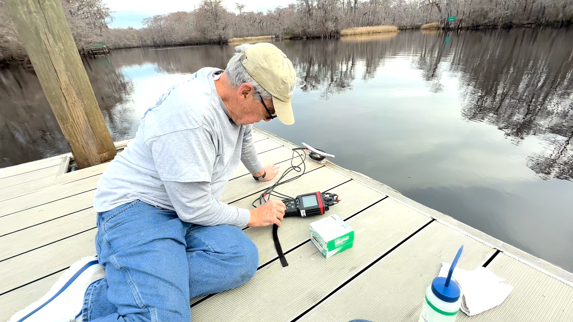 Volunteer taking reading at Pitch Landing 