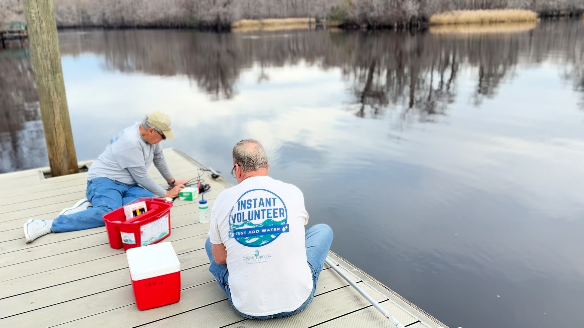Volunteers with the Volunteer Water Quality Monitoring Program visit Pitch Landing sampling site 