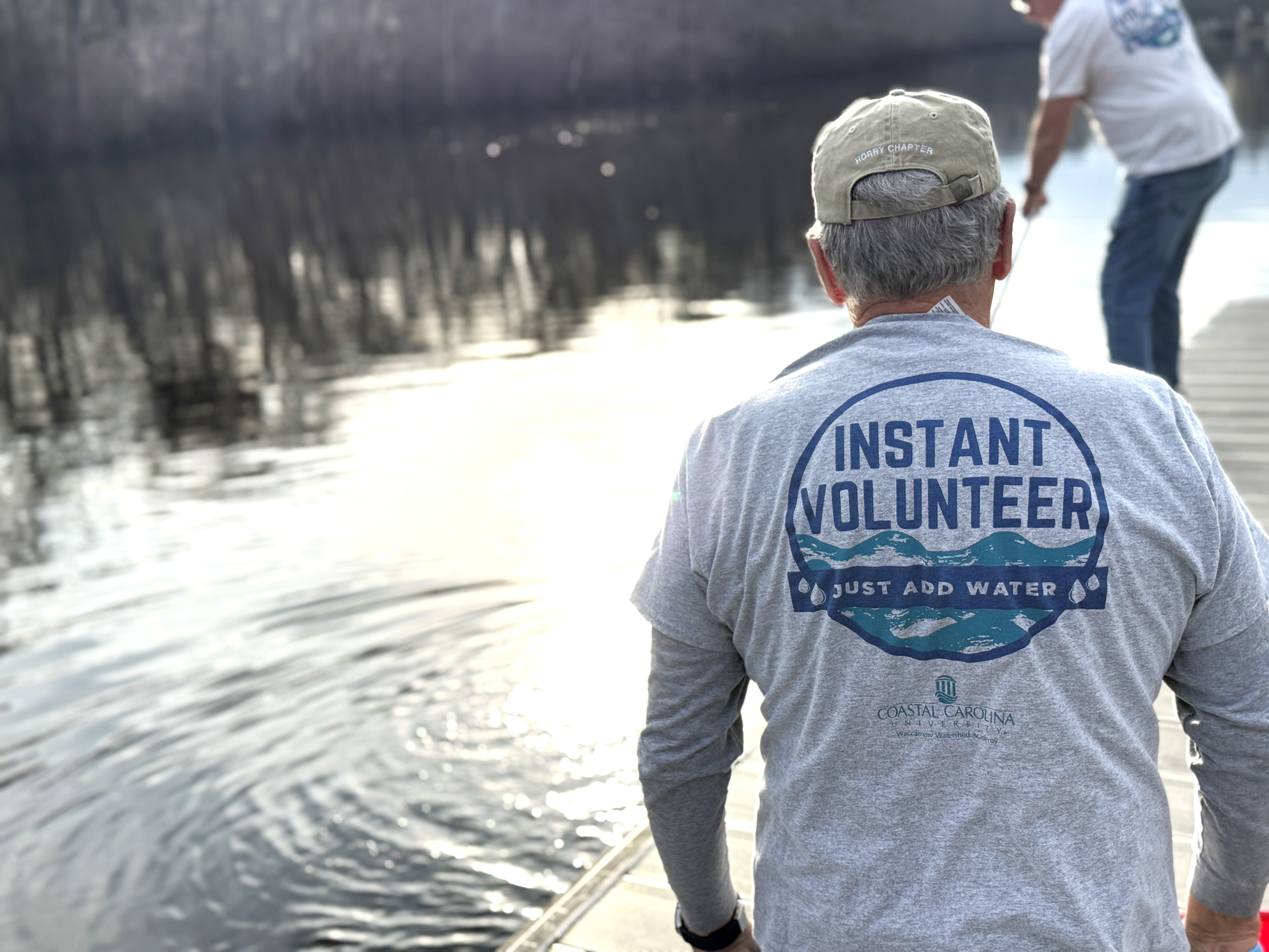 Volunteers with the Volunteer Water Quality Monitoring Program visit Pitch Landing sampling site 