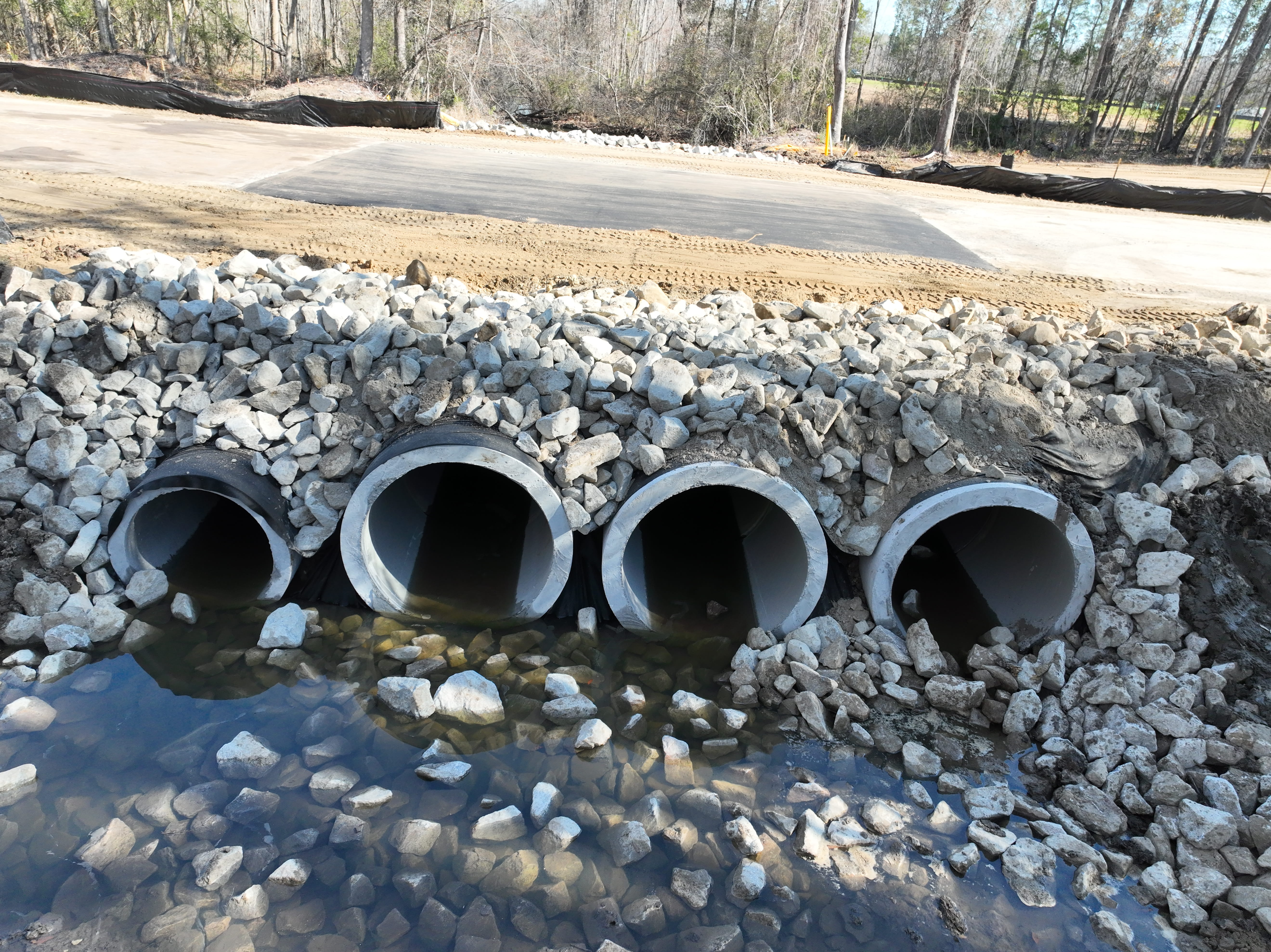 View of four new pipes added beneath Hemingway Chapel Road